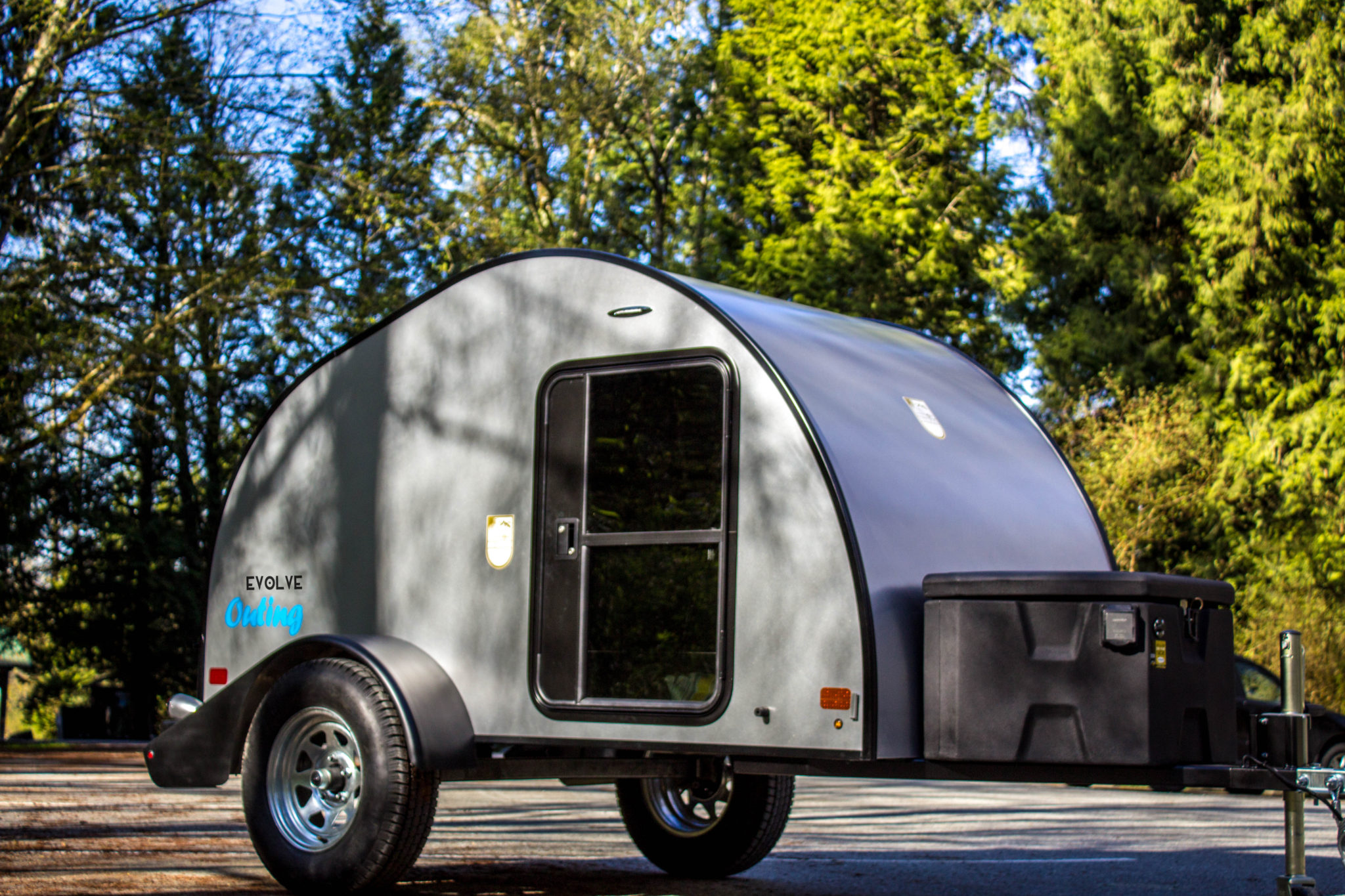The Evolve Outing Solar Teardrop Trailer parked at camp site